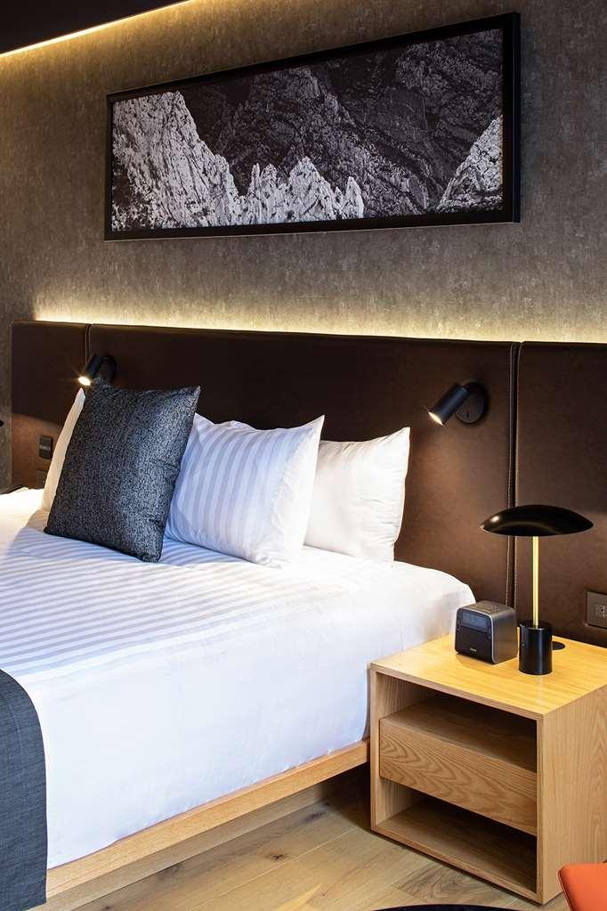 Hotel Galeria Plaza Monterrey Pokoj fotografie A bed at the hotel